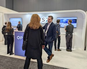 Opus 2 team talking with clients at Legalweek
